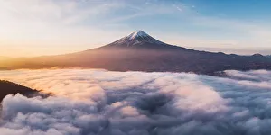 Aerial view of Mt Fuji and sea of fog at sunrise, Yamanashi Prefecture, Japan Aerial view of Mt Fuji and sea of fog at sunrise, Yamanashi Prefecture, Japan