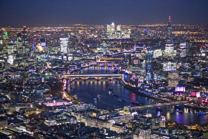 Aerial view over River Thames, City of London, The Shard and Canary Wharf, London Aerial view over River Thames, City of London, The Shard and Canary Wharf, London