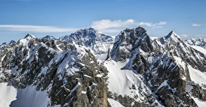 Aerial view of Torrone Peak in winter with Bernina Peak in the background. Valmasino Aerial view of Torrone Peak in winter with Bernina Peak in the background. Valmasino