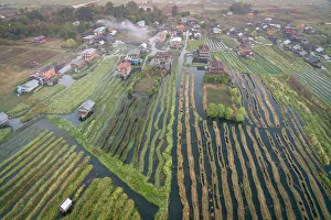 Aerial view of village and floating gardens before sunrise, Lake Inle Aerial view of village and floating gardens before sunrise, Lake Inle