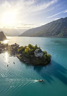 Switzerland Collection: Aerial view of the village of Iseltwald and its peninsula with the old Castle during