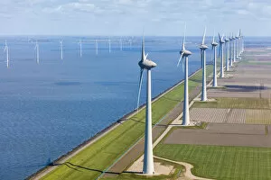 Netherlands Collection: Aerial view of wind turbines on land and at sea, North Holland, Netherlands