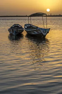 Saloum Delta Collection: Africa, Senegal, Sine-Saloum-Delta. Fishing boats at sunrise