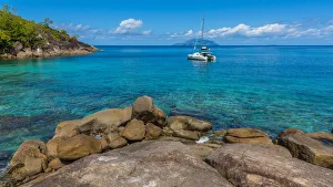 africa, Seychelles, Mahe. Near Anse Major, catamaran with silhouette Island in the back africa, Seychelles, Mahe. Near Anse Major, catamaran with silhouette Island in the back