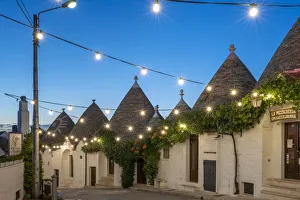 Alberobello, province of Bari, Apulia, Italy The typical Trulli huts at dawn Alberobello, province of Bari, Apulia, Italy The typical Trulli huts at dawn