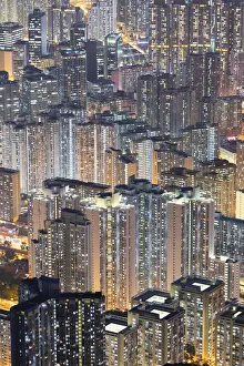 Apartment blocks at dusk, Kowloon, Hong Kong Apartment blocks at dusk, Kowloon, Hong Kong
