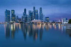 Asia, Singapore, Singapore Skyline and Financial district under gathering storm clouds Asia, Singapore, Singapore Skyline and Financial district under gathering storm clouds