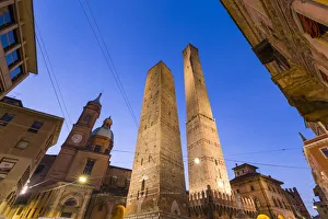 Asinelli and Garisenda towers in Bologna at twilight. Bologna, Emilia Romagna, Italy Asinelli and Garisenda towers in Bologna at twilight. Bologna, Emilia Romagna, Italy