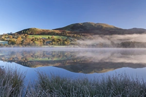 Autumnal reflections on a frosty morning at Loweswater in the Lake District National Park Autumnal reflections on a frosty morning at Loweswater in the Lake District National Park