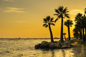 A beach scene at Palm Beach in Larnaca, Cyprus A beach scene at Palm Beach in Larnaca, Cyprus