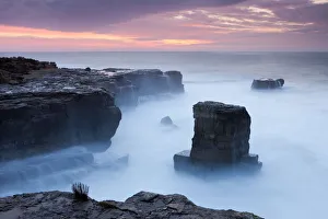 Beautiful sunrise over the rocky coast of Portland Bill on the Jurassic Coast, Dorset Beautiful sunrise over the rocky coast of Portland Bill on the Jurassic Coast, Dorset