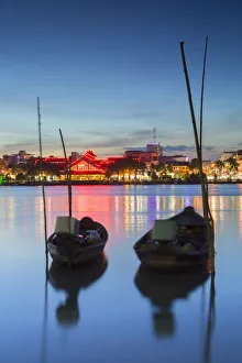 Boats on Can Tho River at dusk, Can Tho, Mekong Delta, Vietnam Boats on Can Tho River at dusk, Can Tho, Mekong Delta, Vietnam