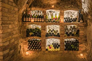 Bottles of wine arranged inside old wine cellar in Vrbice, Breclav District Bottles of wine arranged inside old wine cellar in Vrbice, Breclav District