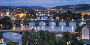 Bridges over Vltava river against sky seen from Letna park at night, Prague, Bohemia Bridges over Vltava river against sky seen from Letna park at night, Prague, Bohemia