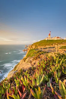 Cabo de Roca, Colares, Sintra, Lisbon district, Portugal. Lighthouse at sunset Cabo de Roca, Colares, Sintra, Lisbon district, Portugal. Lighthouse at sunset