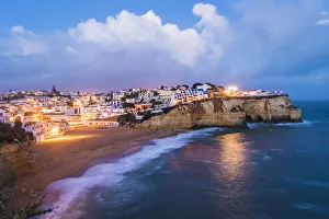Carvoeiro, Lagoa, Algarve, Portugal. City lights at dusk Carvoeiro, Lagoa, Algarve, Portugal. City lights at dusk