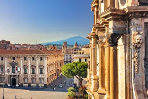 Catania, Sicily. Elevated view of the town with Etna volcano in the background