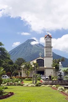 Central America, Costa Rica, Alajuela, La Fortuna town, Arenal volcano sitting behind Central America, Costa Rica, Alajuela, La Fortuna town, Arenal volcano sitting behind
