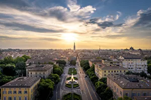 The city of Modena with its tower named Ghirlandina, during sunset The city of Modena with its tower named Ghirlandina, during sunset