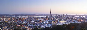 City Skyline illuminated at dawn, Auckland, North Island, New Zealand, Australasia City Skyline illuminated at dawn, Auckland, North Island, New Zealand, Australasia