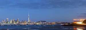 City skyline & Waitemata Harbour illuminated at dusk, Auckland, New Zealand, Australasia City skyline & Waitemata Harbour illuminated at dusk, Auckland, New Zealand, Australasia
