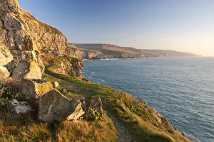 British Winter Landscapes Prints: Cliff top footpath running alongside limestone cliffs, Winspit, Dorset, England