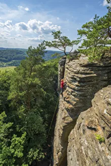 Climbers on rock formations near Berdorf, MAA¼llerthal, Kanton Echternach, Luxembourg Climbers on rock formations near Berdorf, MAA¼llerthal, Kanton Echternach, Luxembourg