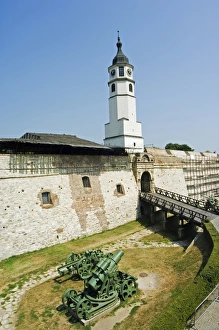 Clock Tower and modern Military Cannon in the Grounds Clock Tower and modern Military Cannon in the Grounds