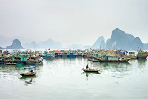 Colorful fishing boats in the harbor at Cai Rong, Quang Ninh Province, Vietnam Colorful fishing boats in the harbor at Cai Rong, Quang Ninh Province, Vietnam