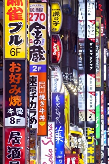 Colorful neon signs at the Kabukicho red light district, Shinjuku, Tokyo, Japan Colorful neon signs at the Kabukicho red light district, Shinjuku, Tokyo, Japan