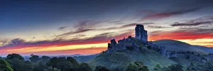 Corfe Castle at Sunrise, Dorset, England Corfe Castle at Sunrise, Dorset, England