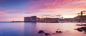 Croatia, Dubrovnik, Boats in the old town harbour at sunset Croatia, Dubrovnik, Boats in the old town harbour at sunset