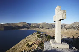 Cross on summit of Cerro Calvario, Copacabana, Lake Titicaca, Bolivia Cross on summit of Cerro Calvario, Copacabana, Lake Titicaca, Bolivia