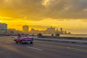 Cuba, Havana, The Malecon, Classic 1950s American car Cuba, Havana, The Malecon, Classic 1950s American car