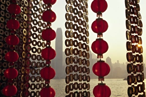 A curtain of Chinese New Year decorations frame a view A curtain of Chinese New Year decorations frame a view
