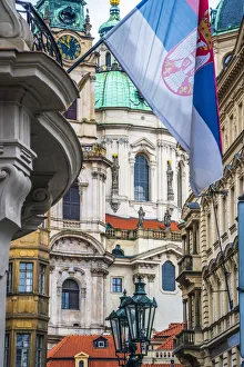 Czech Republic, Prague, Mala Strana, St. Nicholas Church between buildings on Malostranske Czech Republic, Prague, Mala Strana, St. Nicholas Church between buildings on Malostranske