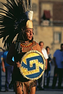 Prints of Dancer in Aztec costume performing in Constitution Plaza in front of the National Palace, Mexico City Images Dated 2009 February: Print of Dancer in Aztec Costume, Mexico City