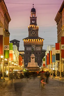 Via Dante pedestrian street and Castello Sforzesco behind, Milan, Lombardy, Italy Via Dante pedestrian street and Castello Sforzesco behind, Milan, Lombardy, Italy