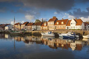 Denmark, Jutland, Ribe, town view from the Ribe River, dawn Denmark, Jutland, Ribe, town view from the Ribe River, dawn