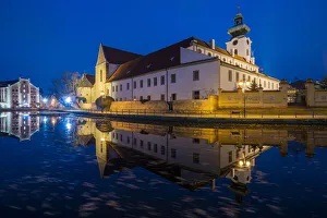 Dominican Monstery reflecting in Malse river at twilight, Ceske Budejovice, South Bohemian Region, Czech Republic Dominican Monstery reflecting in Malse river at twilight, Ceske Budejovice, South Bohemian Region, Czech Republic