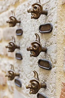 Doorbells shaped like masks, Venice, Veneto, Italy Doorbells shaped like masks, Venice, Veneto, Italy
