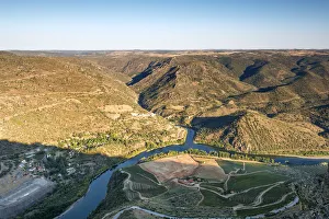 Douro river between Portugal and Spain, in the evening. Portugal on the foreground Douro river between Portugal and Spain, in the evening. Portugal on the foreground