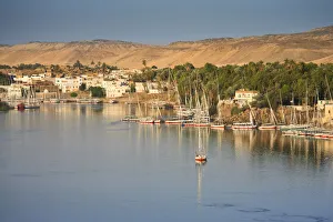 Egypt, Aswan, Feluccas and Nile River ad dawn Egypt, Aswan, Feluccas and Nile River ad dawn