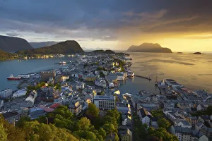 Elevated view over Alesund at sunset, Sunnmore, More og Romsdal, Norway Elevated view over Alesund at sunset, Sunnmore, More og Romsdal, Norway