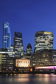 England, London, City of London Skyline and London Bridge and River Thames at Night England, London, City of London Skyline and London Bridge and River Thames at Night