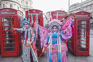 England, London, Soho, Chinatown, Chinese New Year Festival Parade, Couple Dressed England, London, Soho, Chinatown, Chinese New Year Festival Parade, Couple Dressed