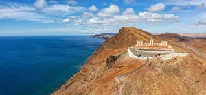 Entallada lighthouse in between desert landscape and the blue Atlantic Ocean Entallada lighthouse in between desert landscape and the blue Atlantic Ocean