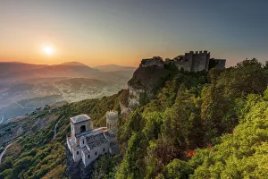 Erice, Sicily. The Norman castle at sunrise, view towards Monte Cofano Erice, Sicily. The Norman castle at sunrise, view towards Monte Cofano