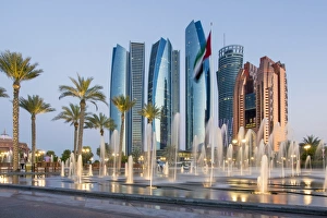 Etihad Towers time lapse viewed over the fountains of the Emirates Palace Hotel, Abu Dhabi Etihad Towers time lapse viewed over the fountains of the Emirates Palace Hotel, Abu Dhabi