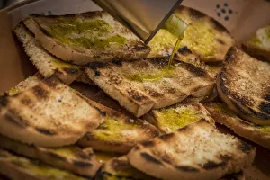 europe, italy, umbria. toasted bread with olive oil europe, italy, umbria. toasted bread with olive oil